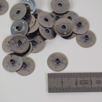 Metal baseplate for candle wick